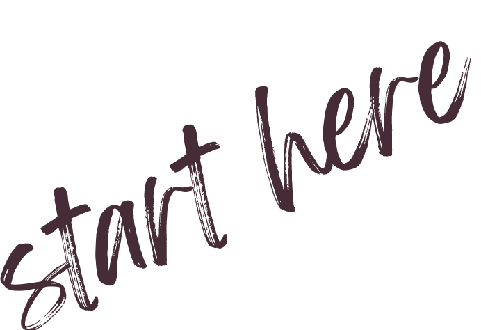 Stylized handwritten text that says "start here" in dark purple, diagonal on a clear background.