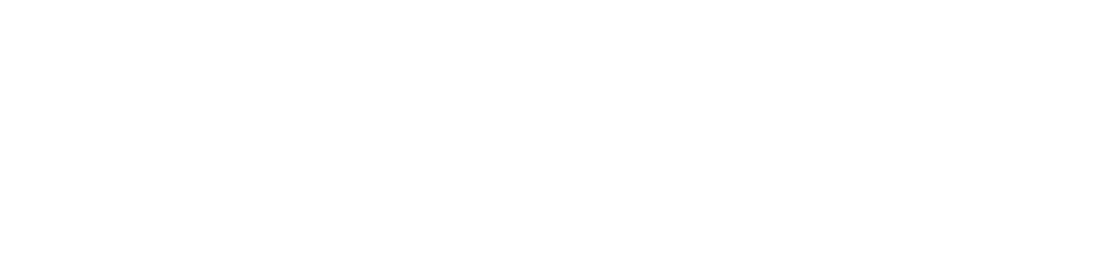 Close-up of the word 'BLOOM' in bold, white uppercase letters on a black background.