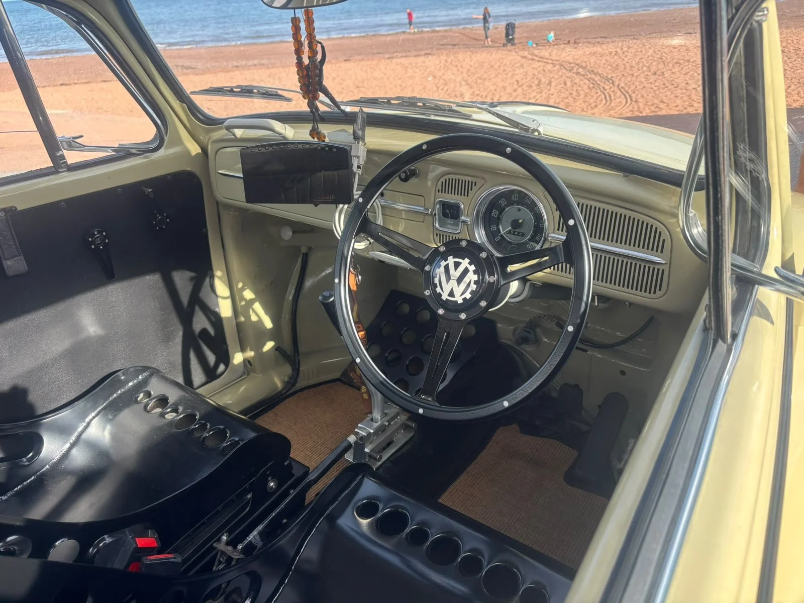 Dashboard and steering wheel of Elvis, our vintage VW Beetle wedding car