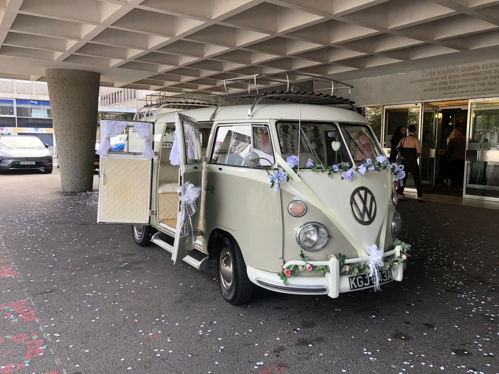 Olivia the VW split-screen campervan dressed for a wedding at Plymouth Register Office