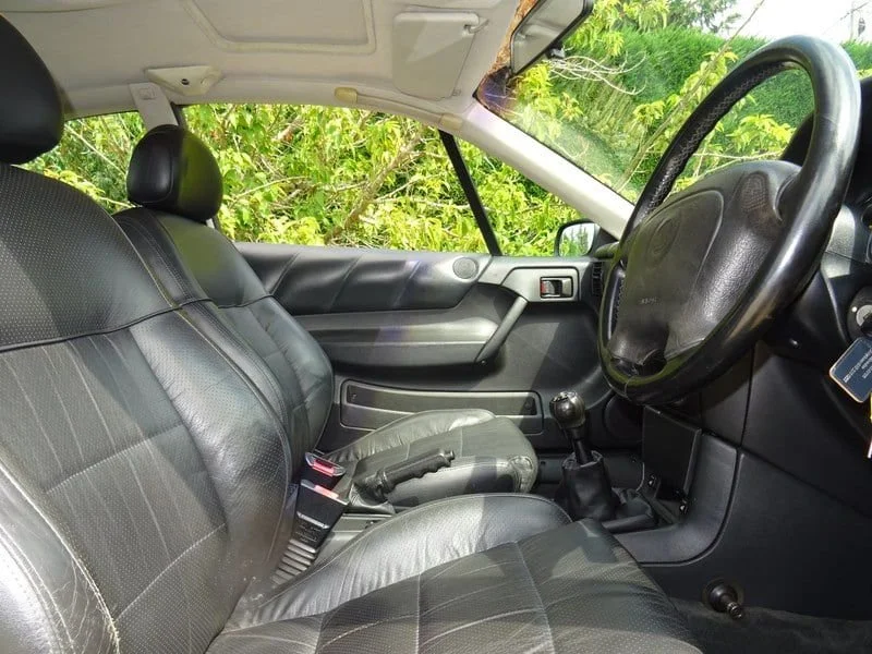 Front seats and dashboard of the Vauxhall Calibra wedding car