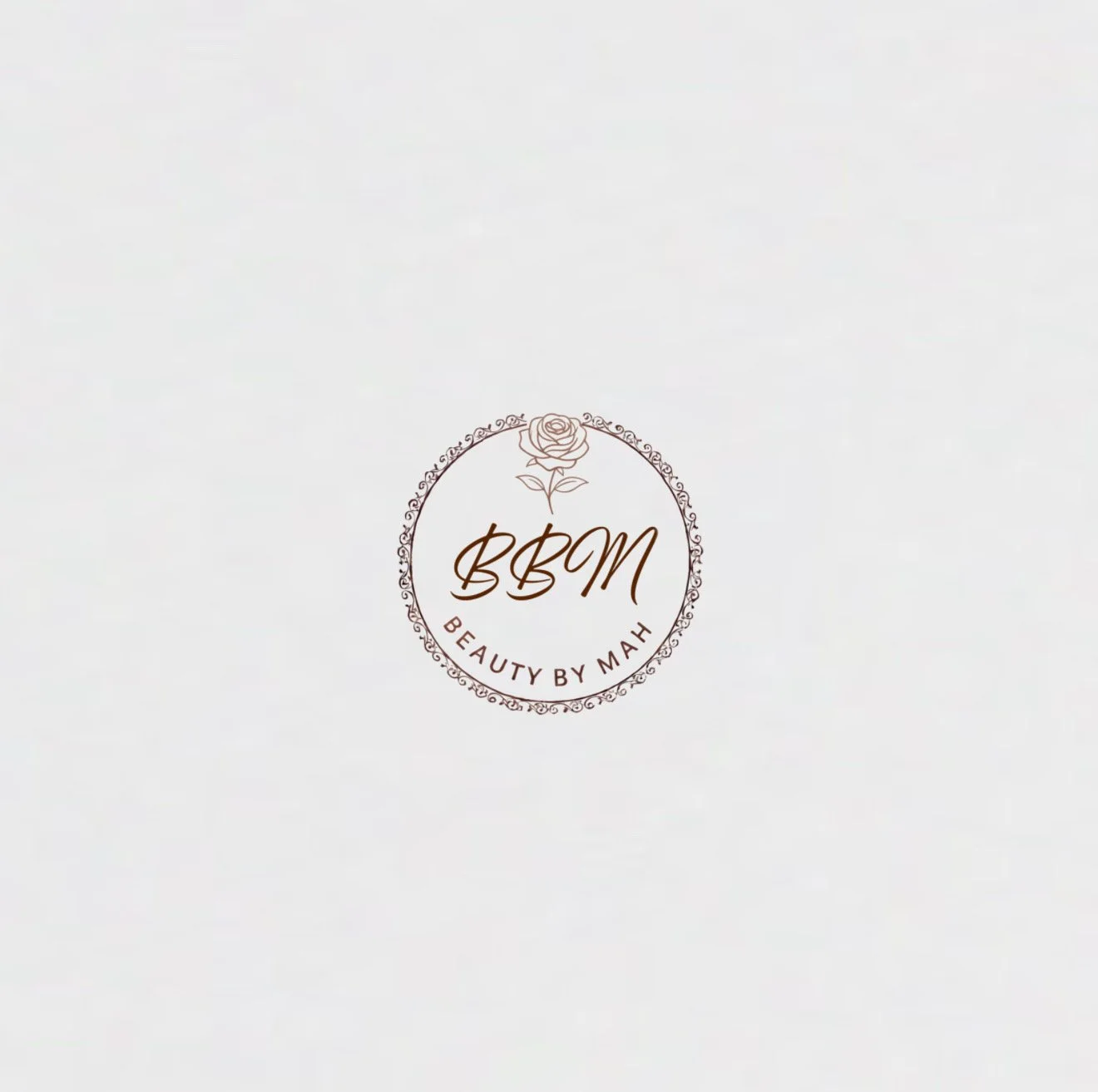 Logo for Beauty by Mah with a rose illustration and decorative border.