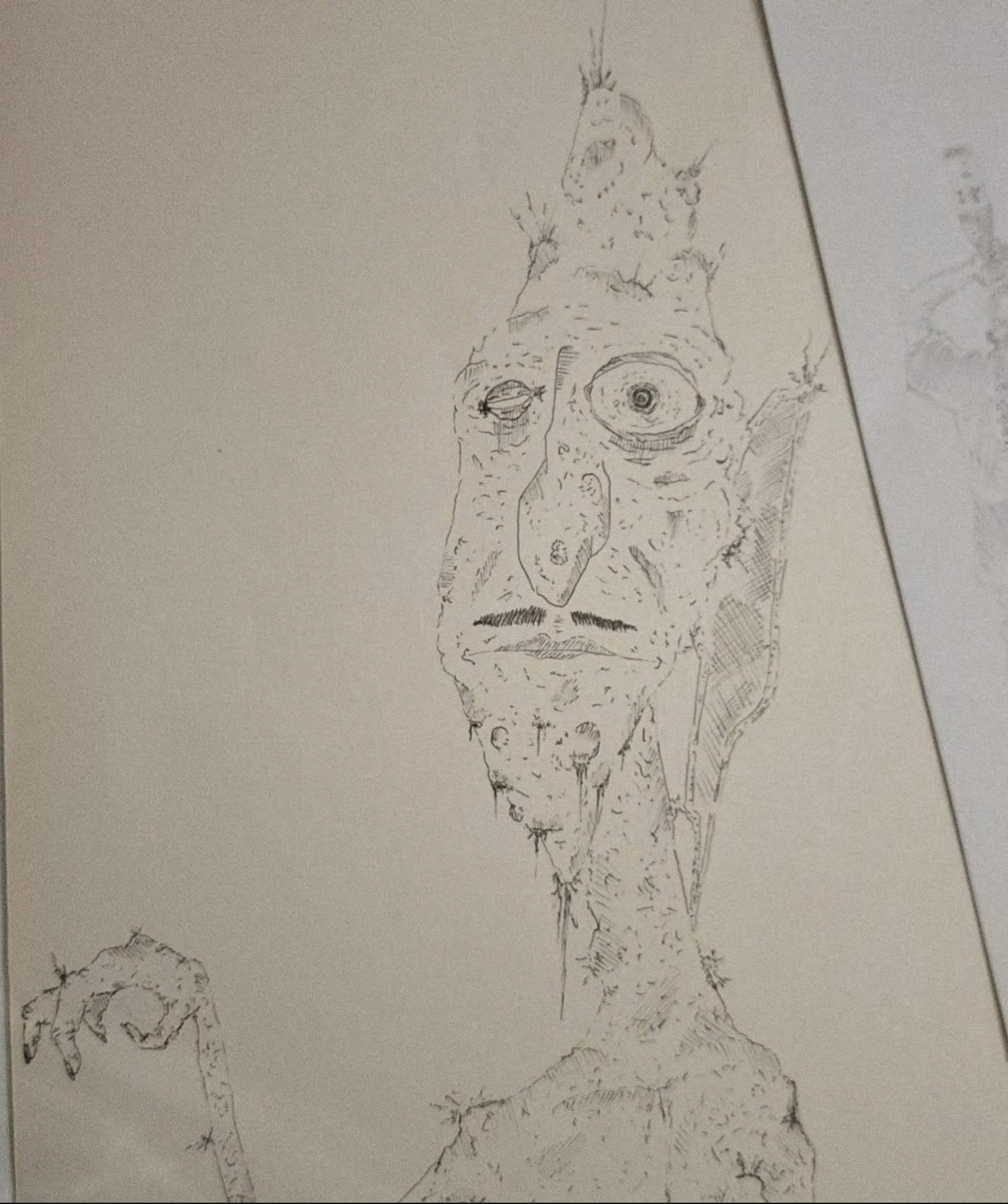 A detailed pencil sketch of an alien with large eyes, a long neck, and a head topped with a small structure, with a hand raised near its face.