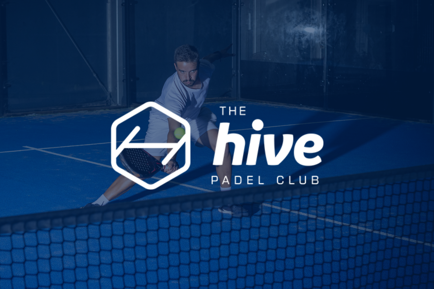 A man playing padel tennis on an indoor court, holding a racket, with the logo for The Hive Padel Club overlayed on the image.