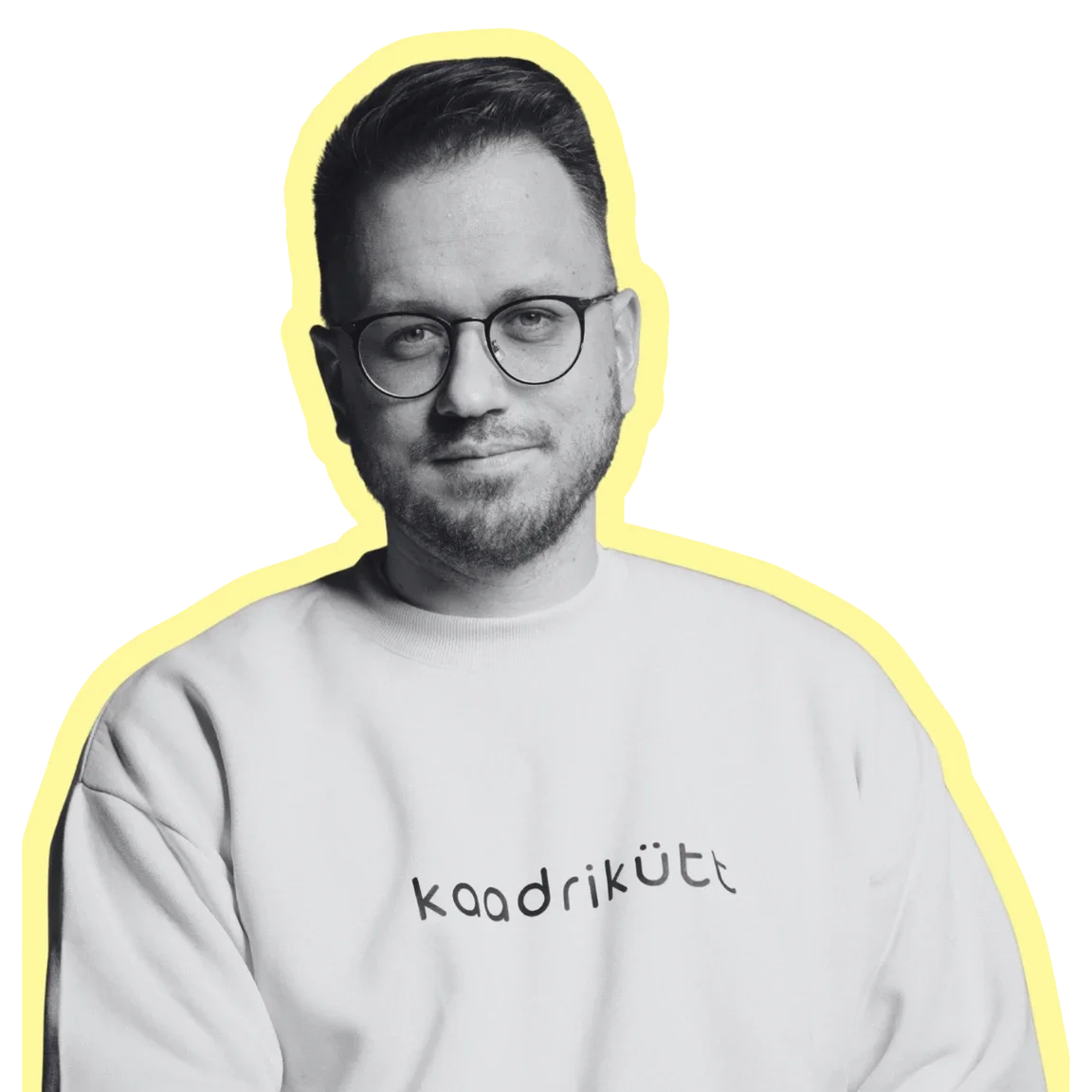 A black and white photo of a man wearing glasses and a sweatshirt with the word 'kaadriküt' on it, outlined with a yellow border and a blue background.