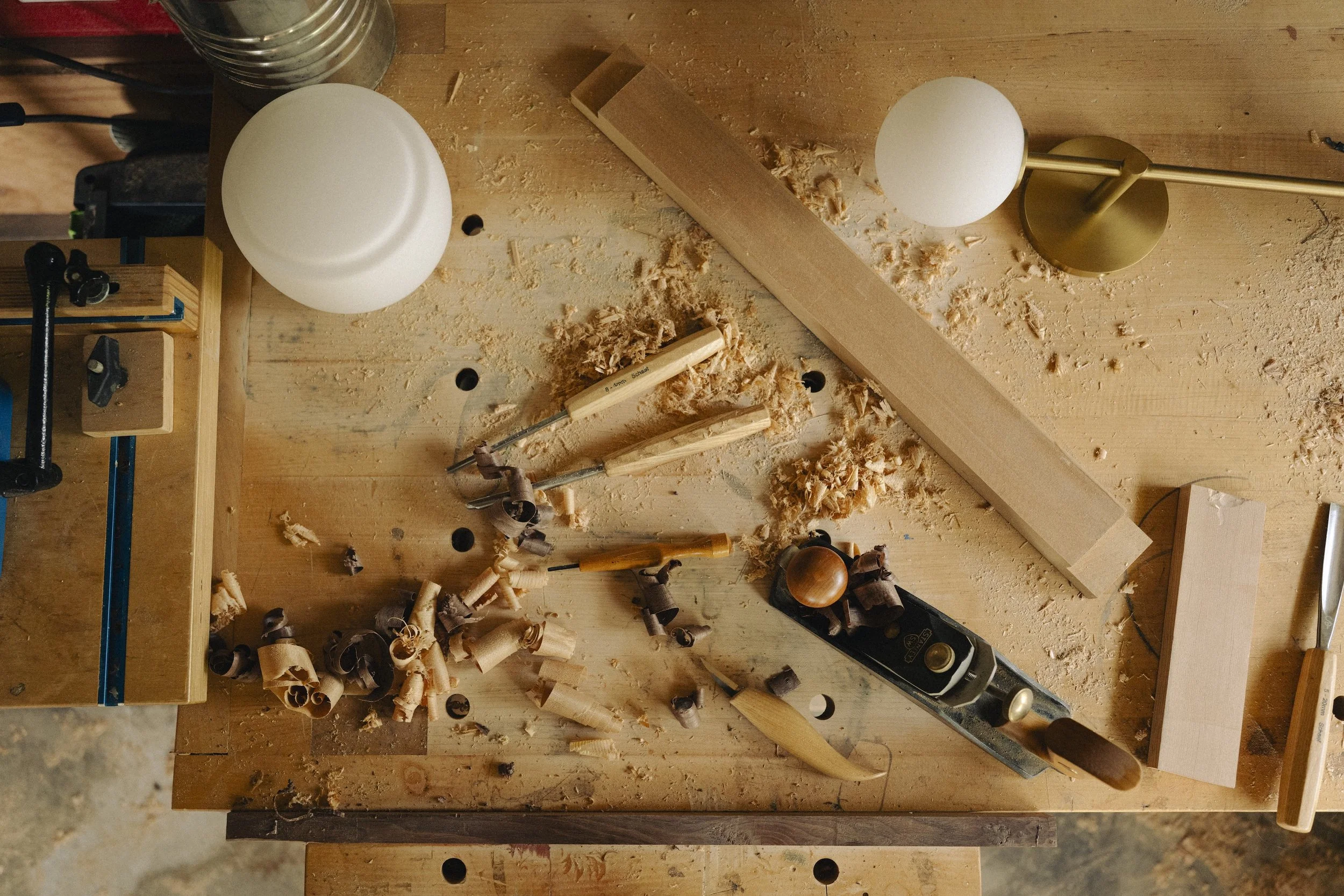 Lighting and furniture shaped through material honesty, restraint, and quiet utility.