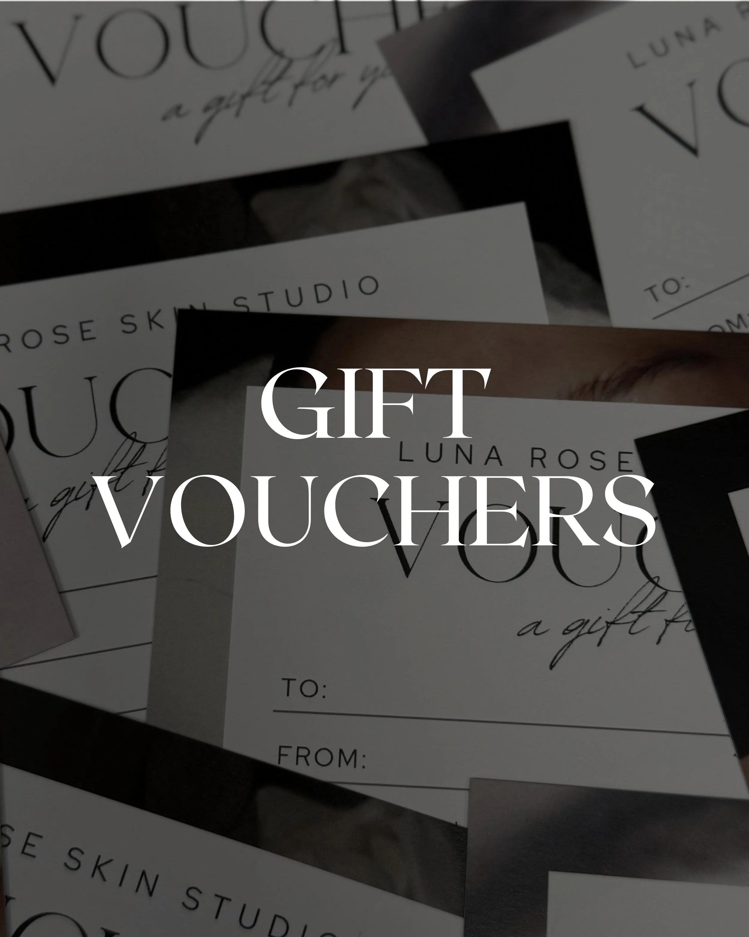 A collection of gift voucher cards with black and white minimalistic designs, featuring text and illustrations, layered on top of each other.