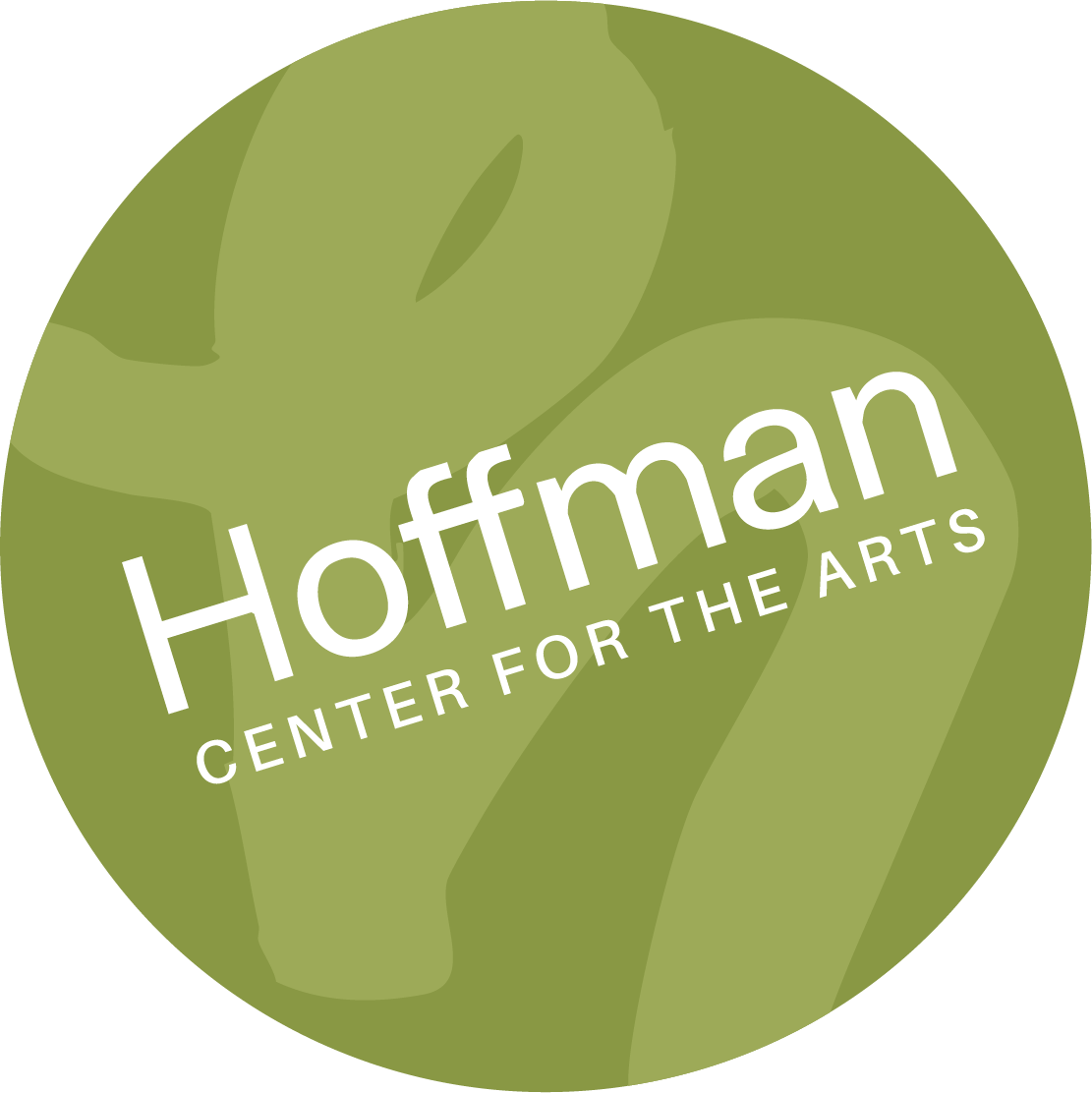 A green circular button with the text "Hoffman Center for the Arts" in white letters.