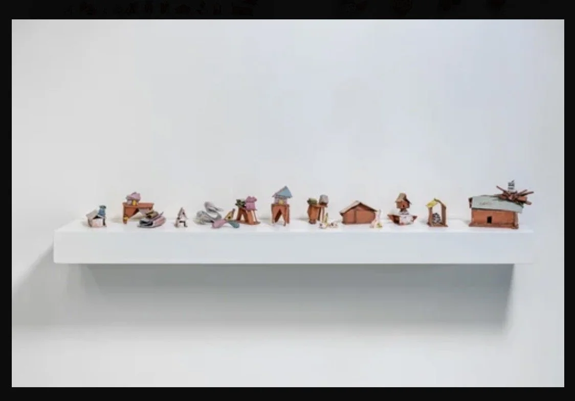 shelf of maquettes - JLT.jpg