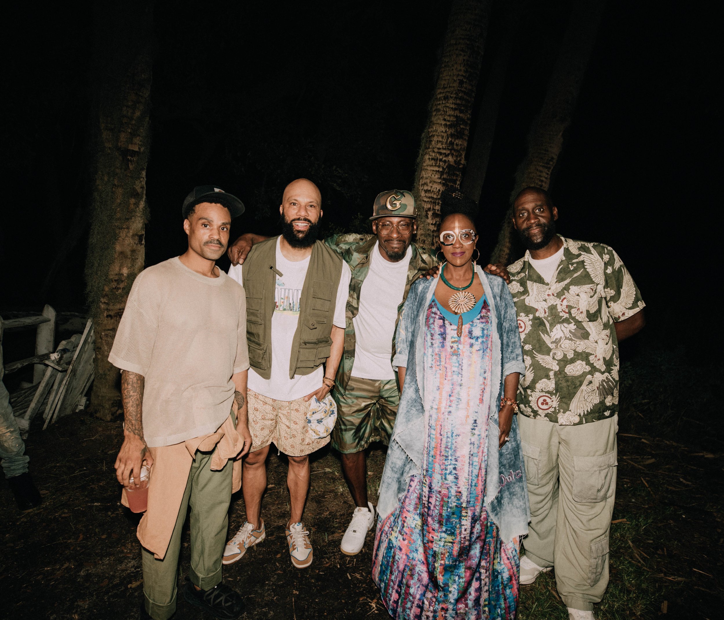 Mahoganee and André Amigér standing outside with three of their friends.