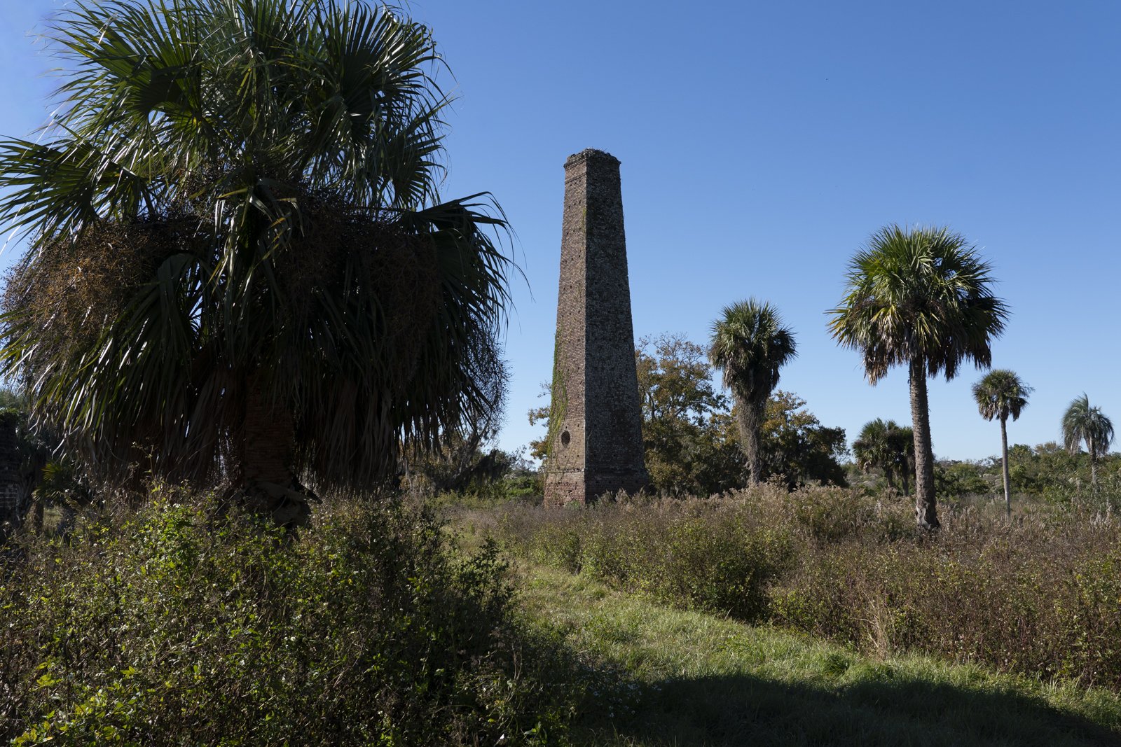 Large brick tower outside at the Butler Island Plantation.