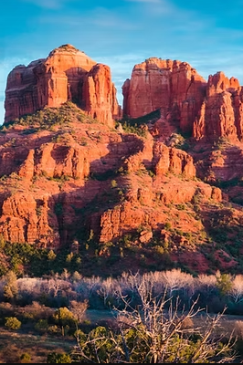 Woman practicing with singing bowls in Sedona AZ