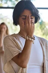 Woman in a mudra at a yoga class at Soul of Yoga
