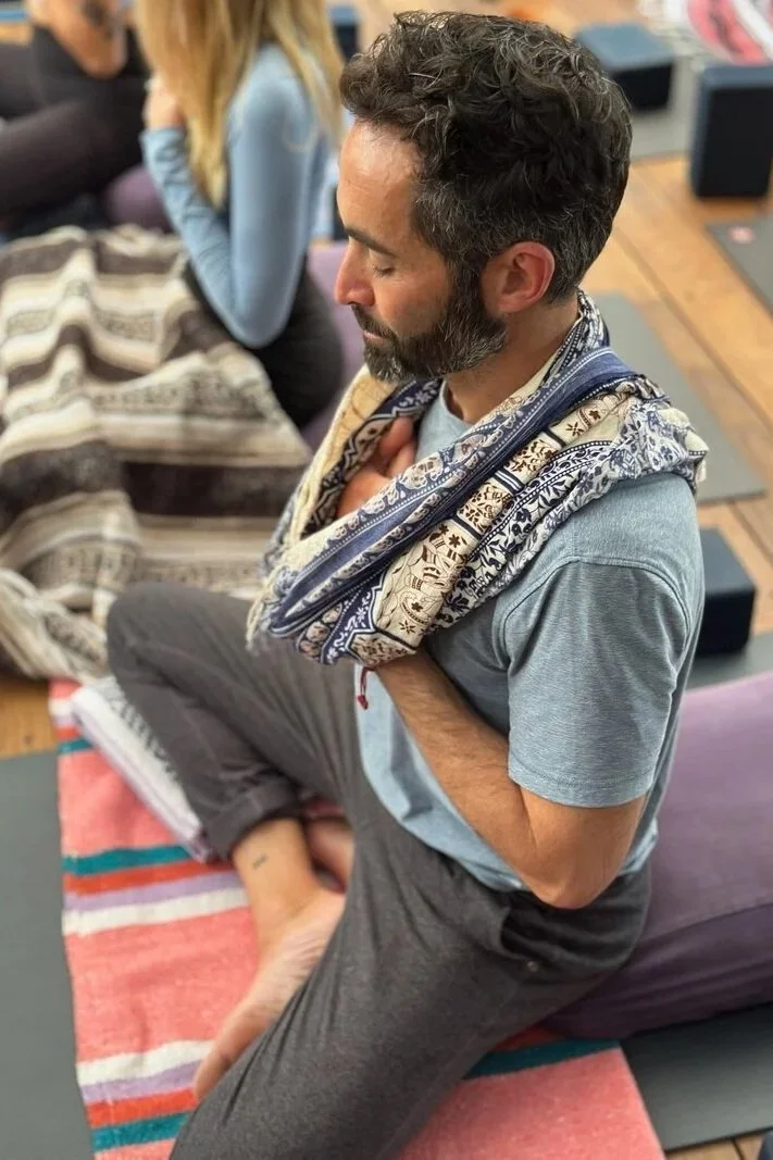 Man meditating at Riffs Yoga & Wellnbess
