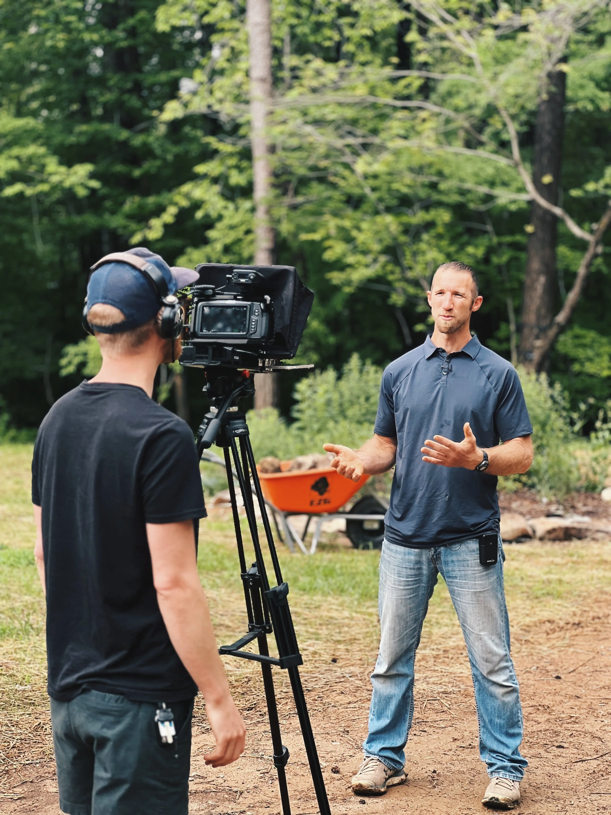 Custom home builder is being interviewed in front of a camera