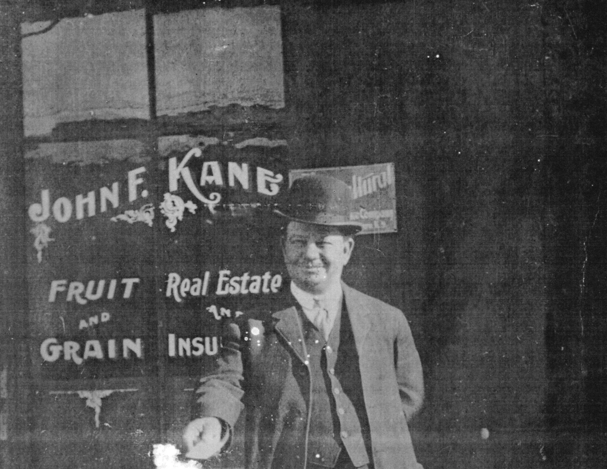 John Francis Kane soliciting business outside the Kane Insurance Agency in the early 1900's