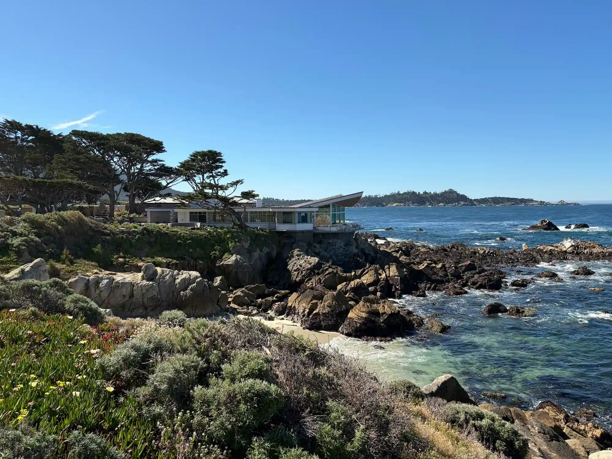 A coastal house in the Monterey County exposed to marine weather and coastal erosion