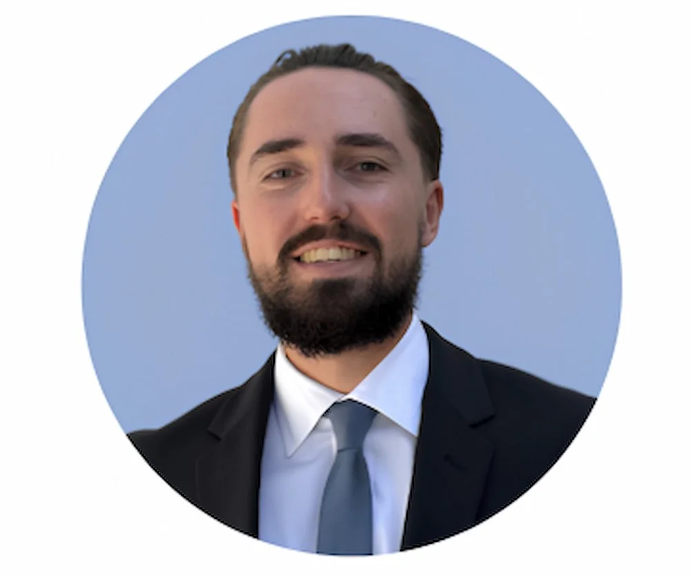 Professional portrait of Jason Kane, financial solutions partner at KBK Insurance Agency
