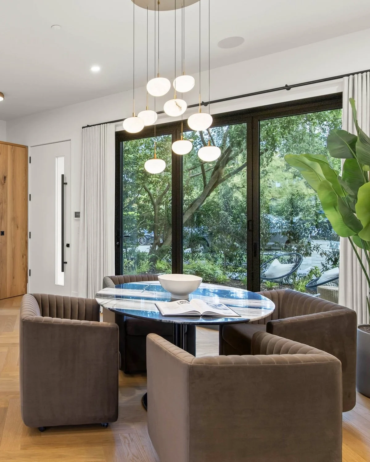 Professionally staged dining room in a luxury half duplex in Point Grey, Vancouver.