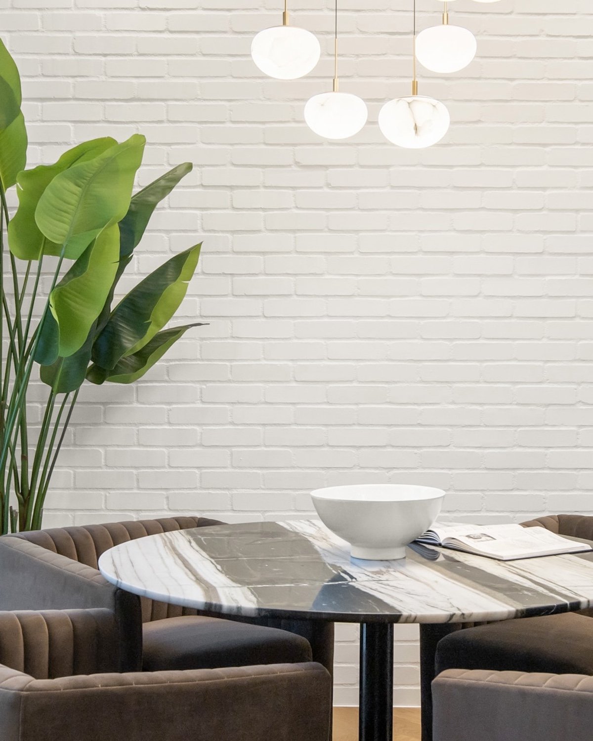 Dining room styling with carefully selected furniture and decorative accents.