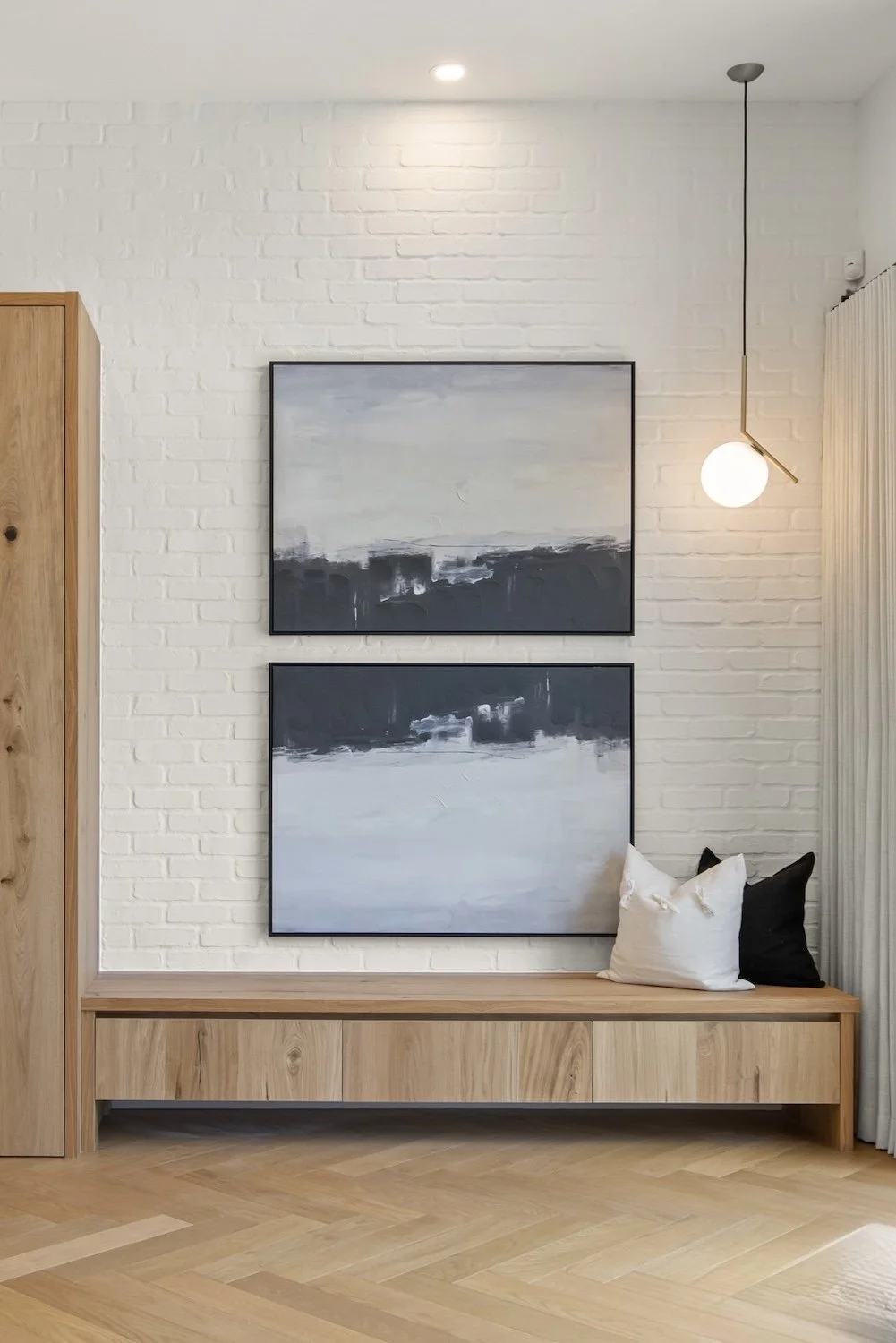 Living room's work art in a professionally staged luxury home.