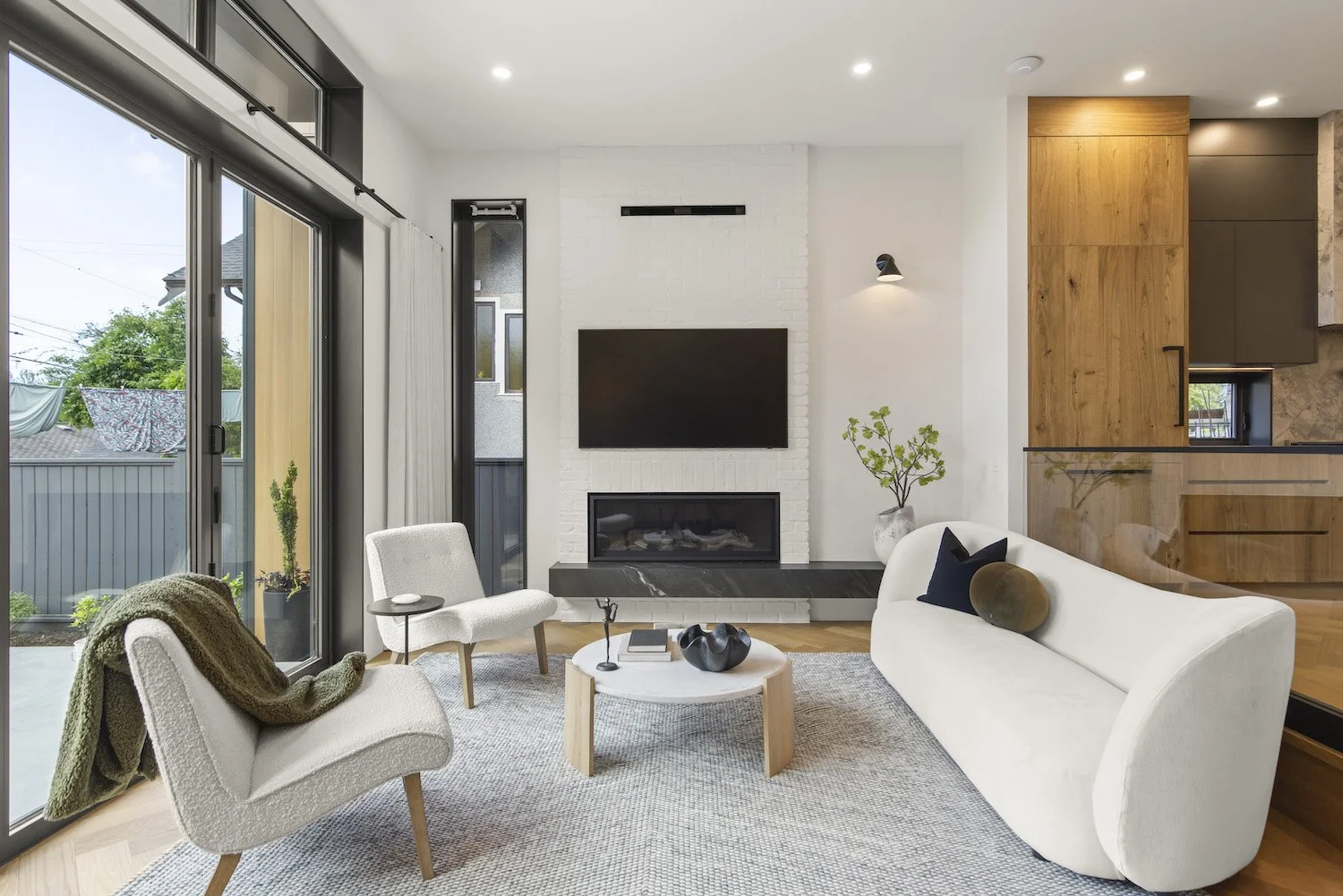 Contemporary sofa and accent furniture arranged in a staged Vancouver living room.