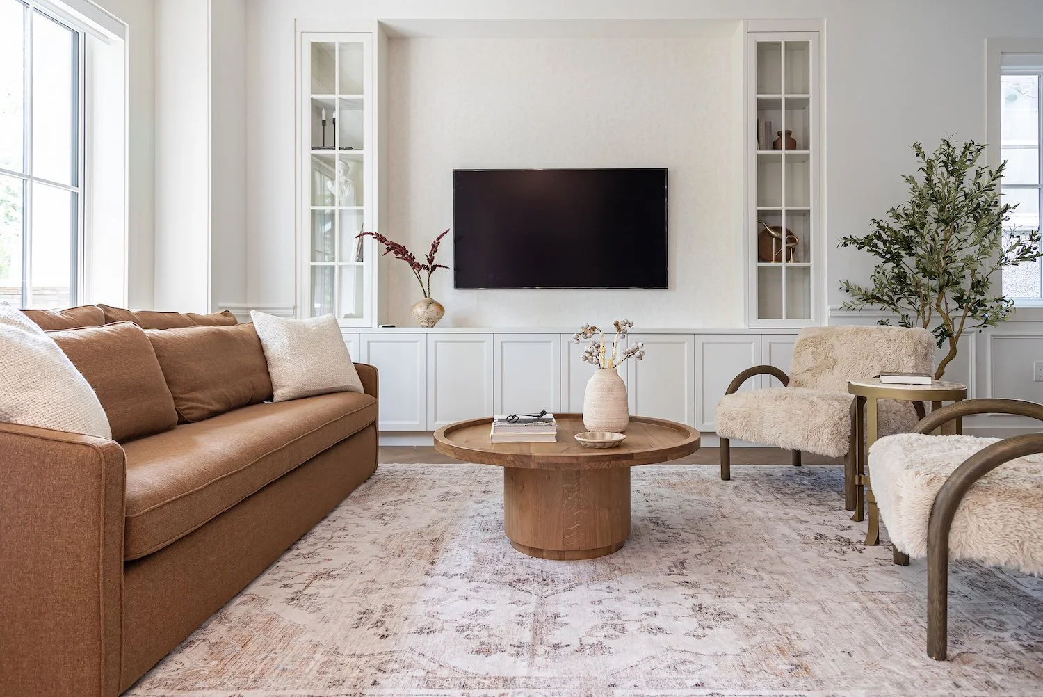 Professionally staged living room featuring contemporary furniture and a refined neutral palette in Cambie Village.