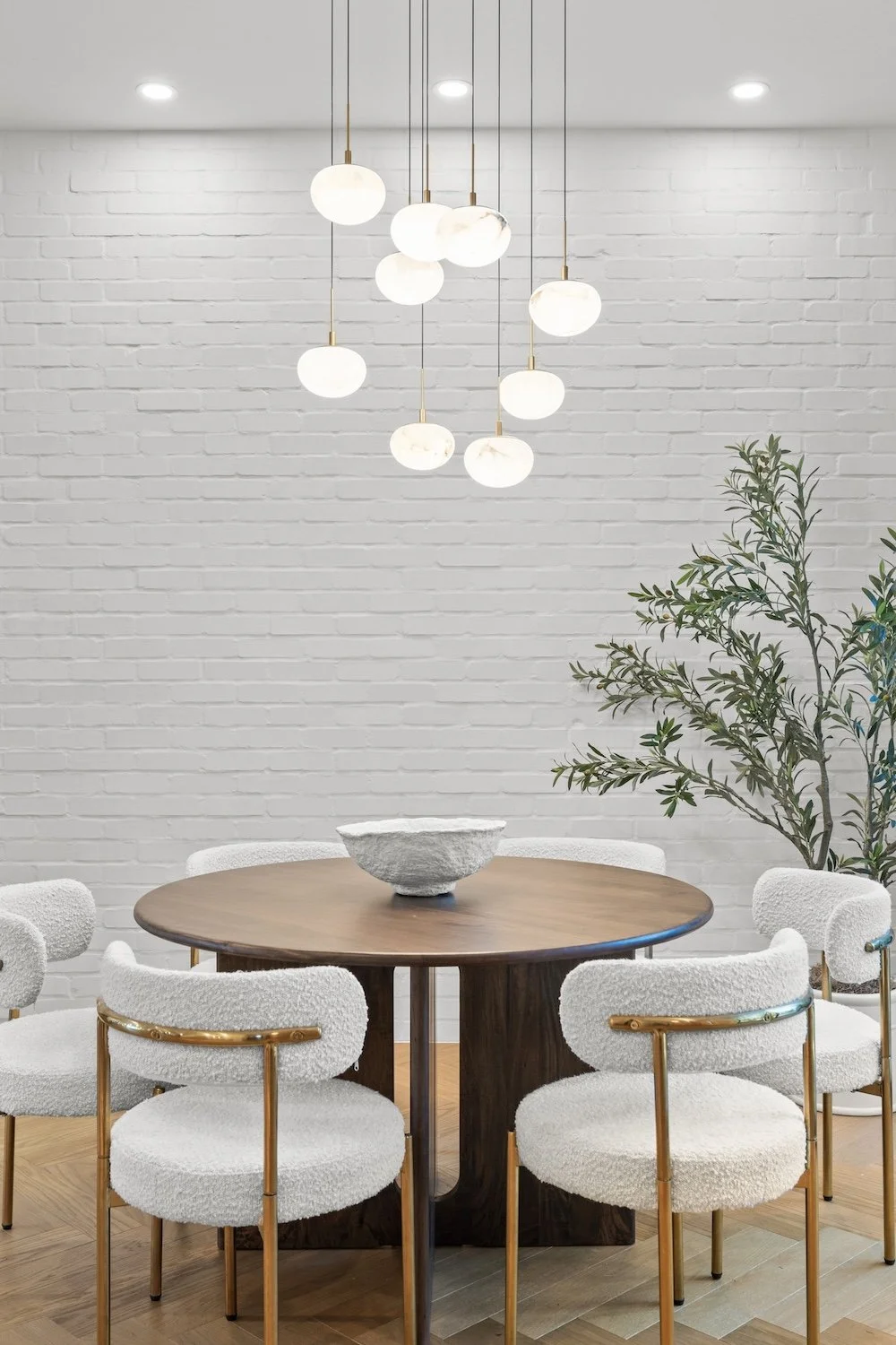 Elegant dining table and contemporary furnishings in a staged Point Grey home.