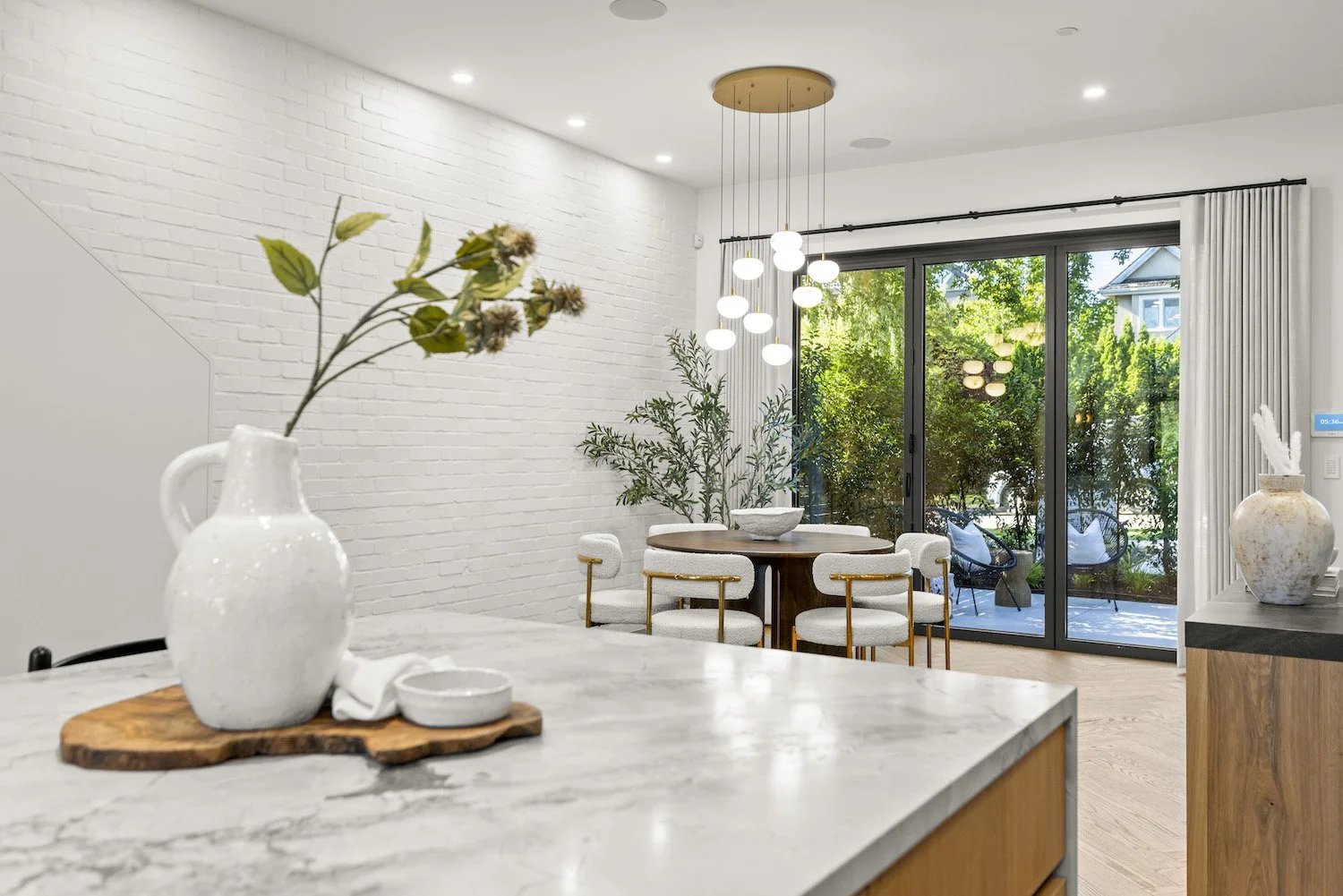 Kitchen island styled with carefully selected accessories in a Point Grey home.