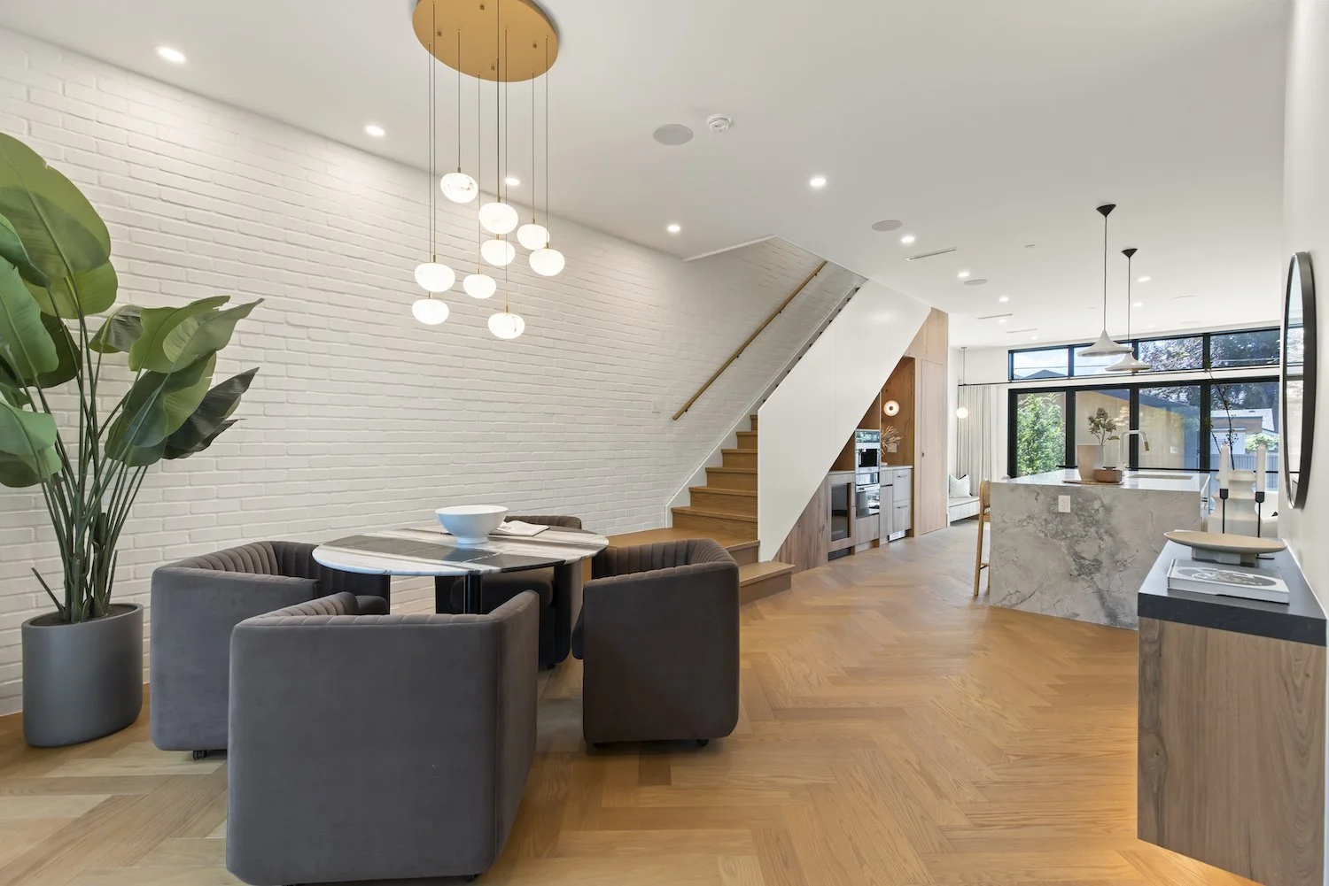 Open-plan dining area showcasing the interior design of a Point Grey half duplex.