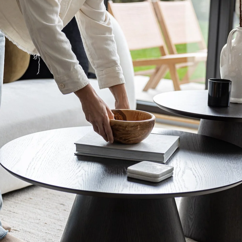 Professional home stager styling a bed during vacant home staging — The Design Alchemist Vancouver Lower Mainland
