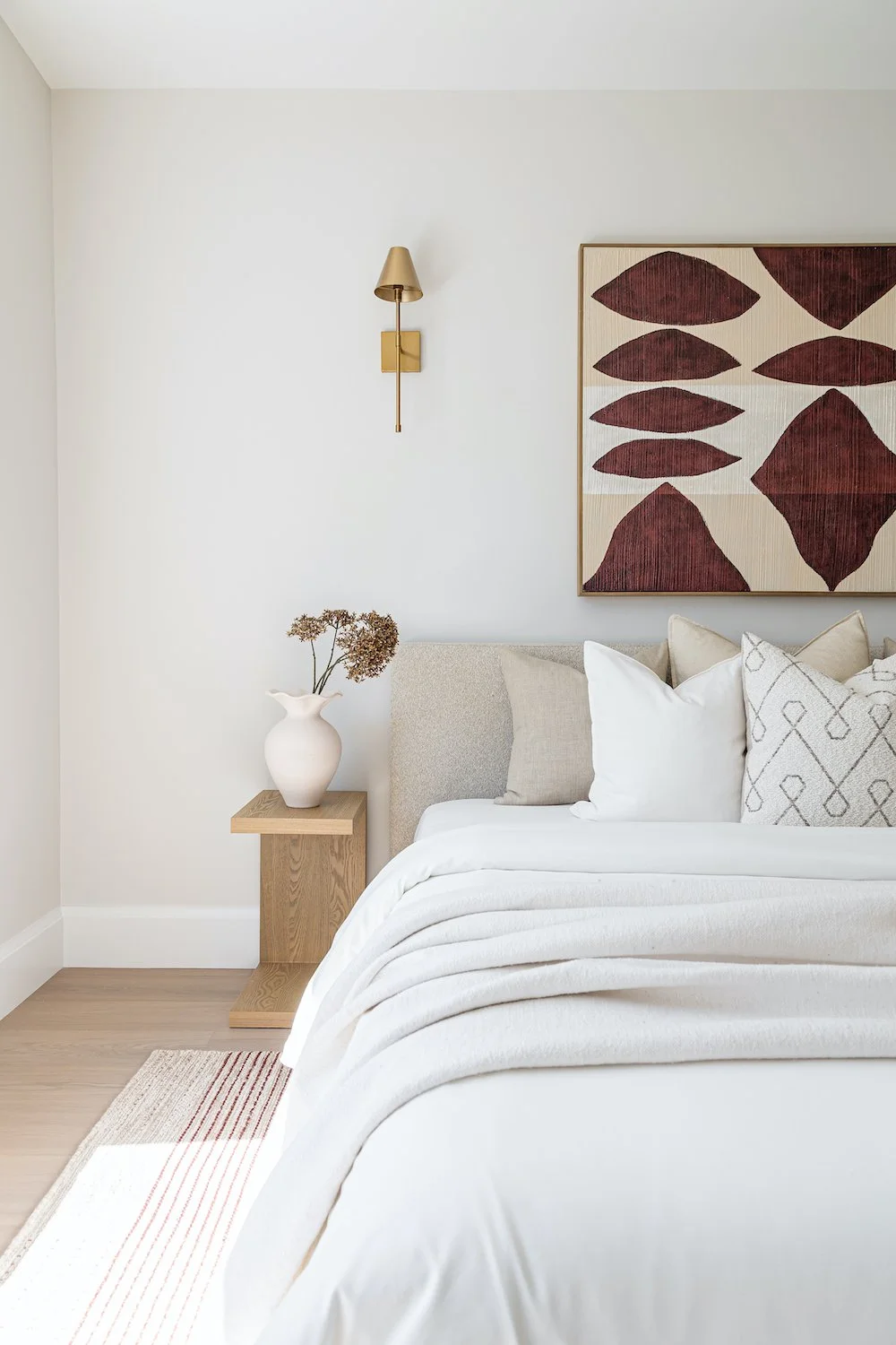 Bright secondary bedroom in a Burnaby luxury home highlighting natural light and contemporary staging