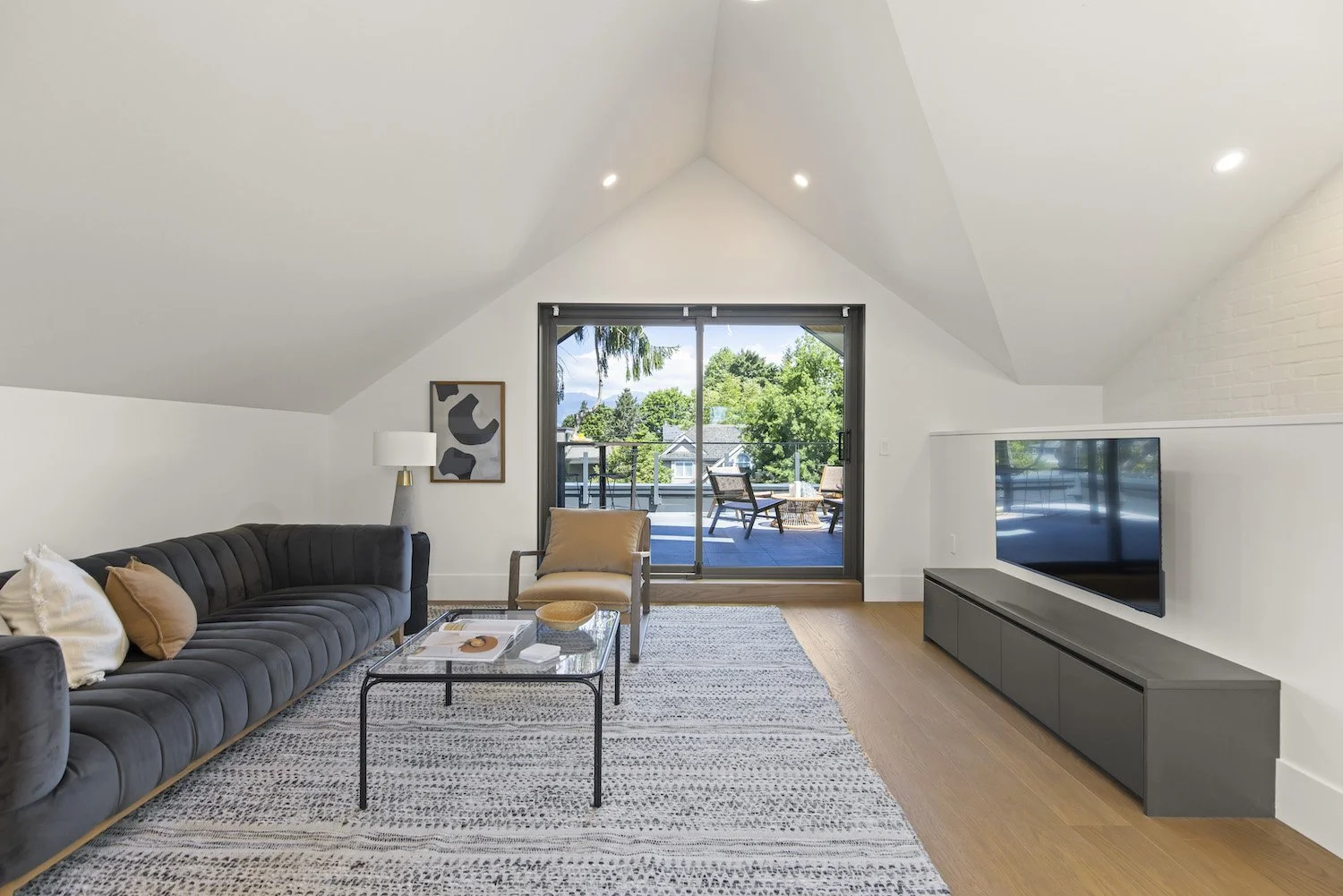 Professionally staged media room in a luxury Point Grey half duplex.