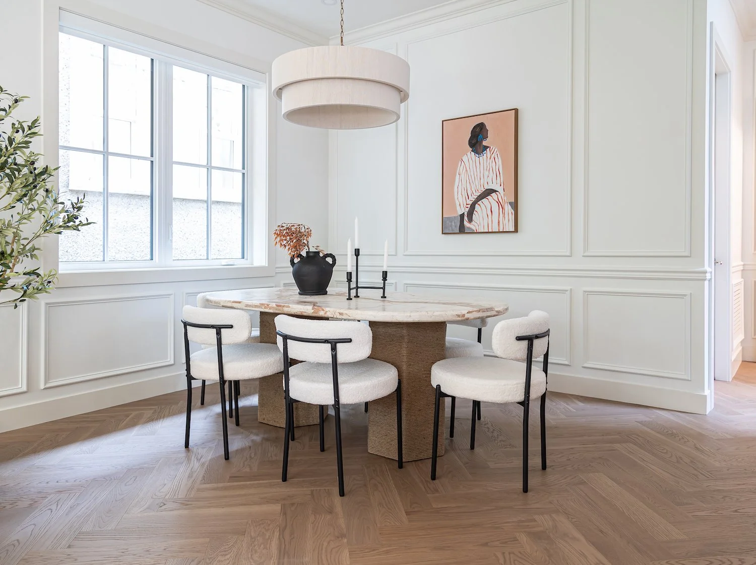 Elegant dining area featuring curated furniture and refined styling in a Vancouver townhouse.