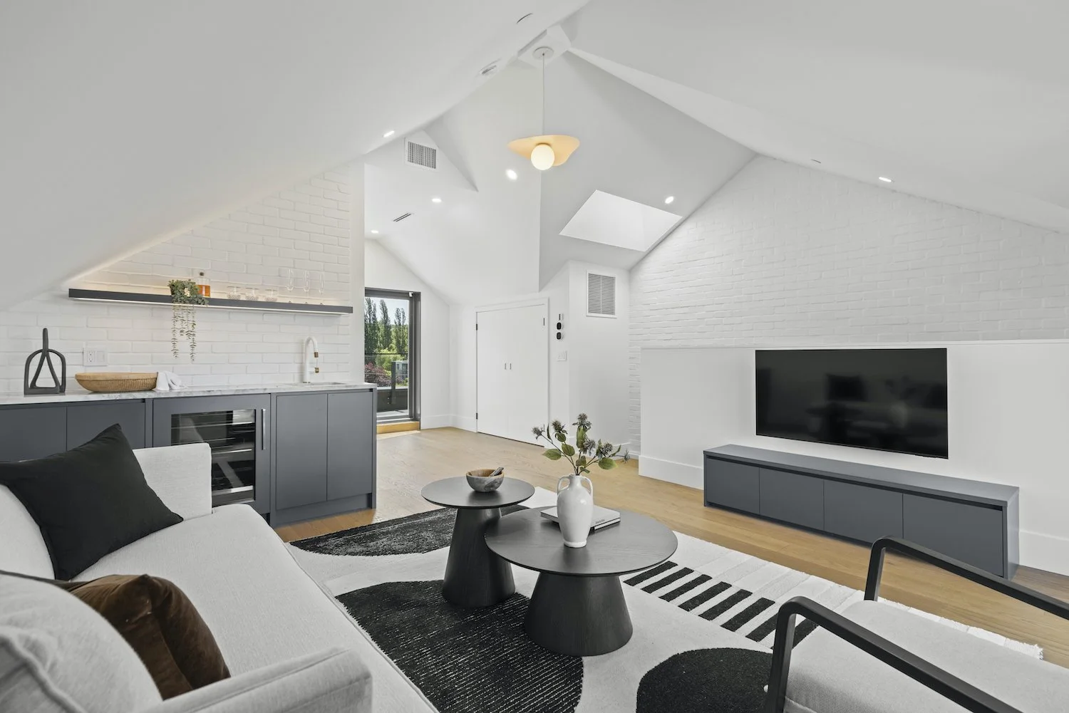 Entertainment room styled to showcase the additional living space in a Vancouver duplex.