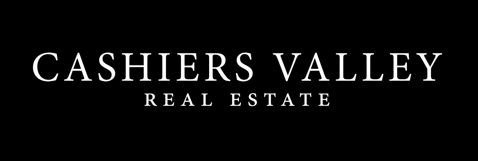 Cashiers Valley Real Estate logo on a black background, featuring the company name in white text.