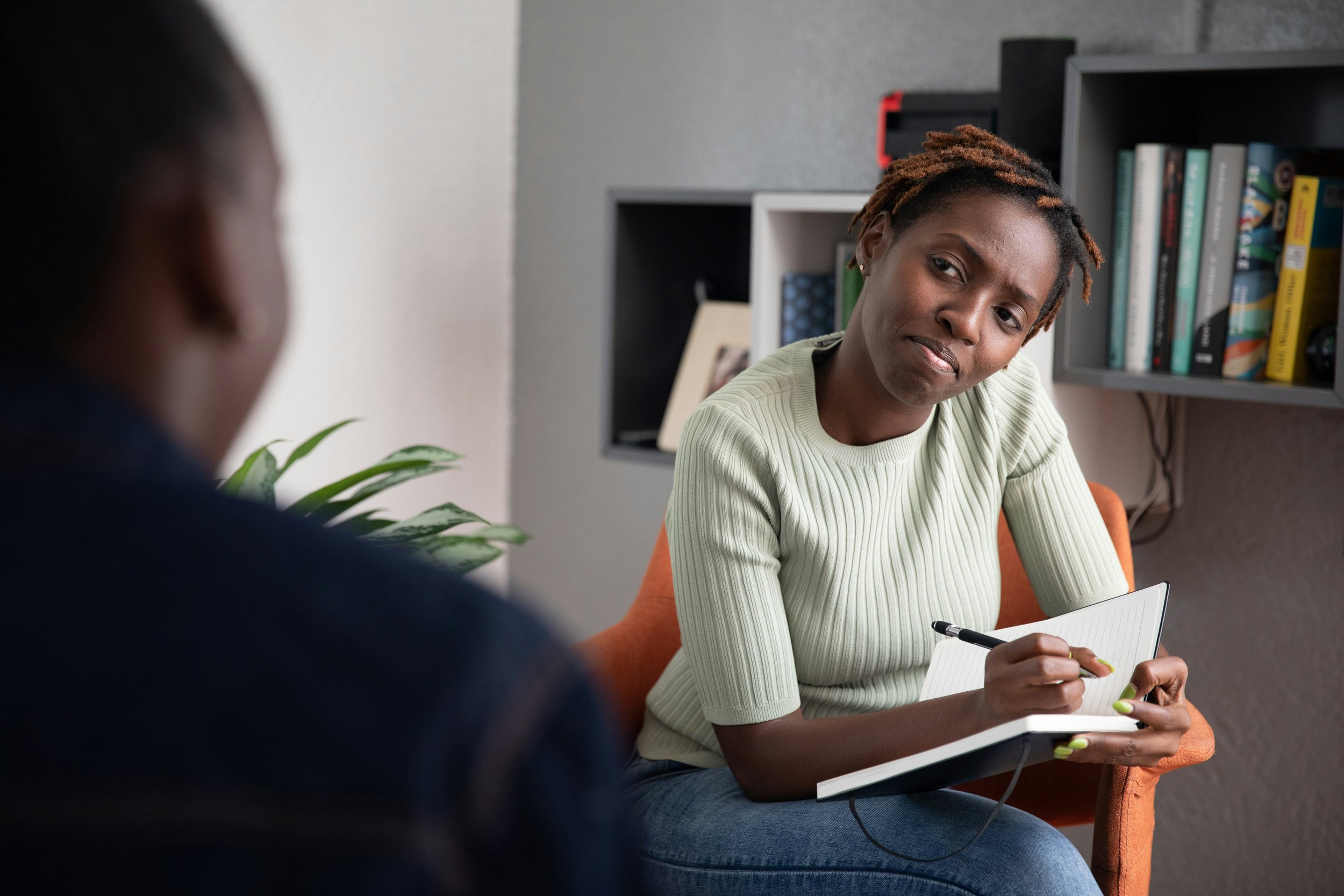 Female therapist working with male client