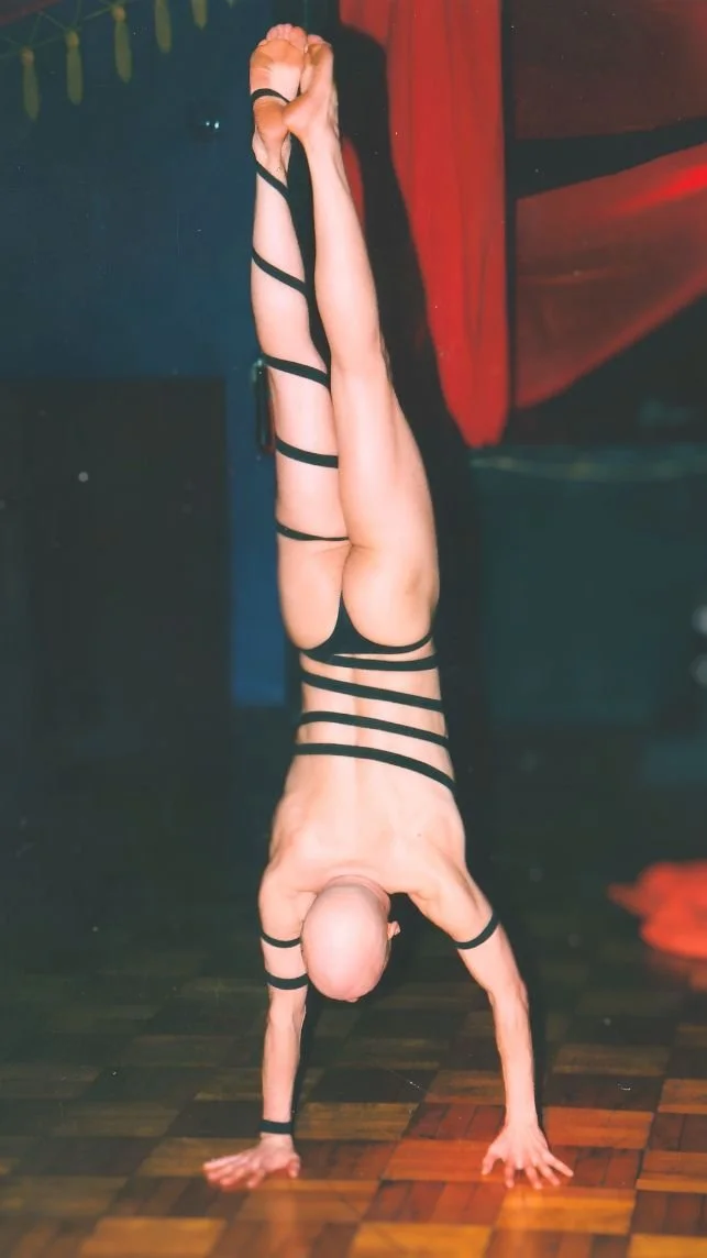 JOHN SHOWING OFF HIS GYMNASTICS TRAINING