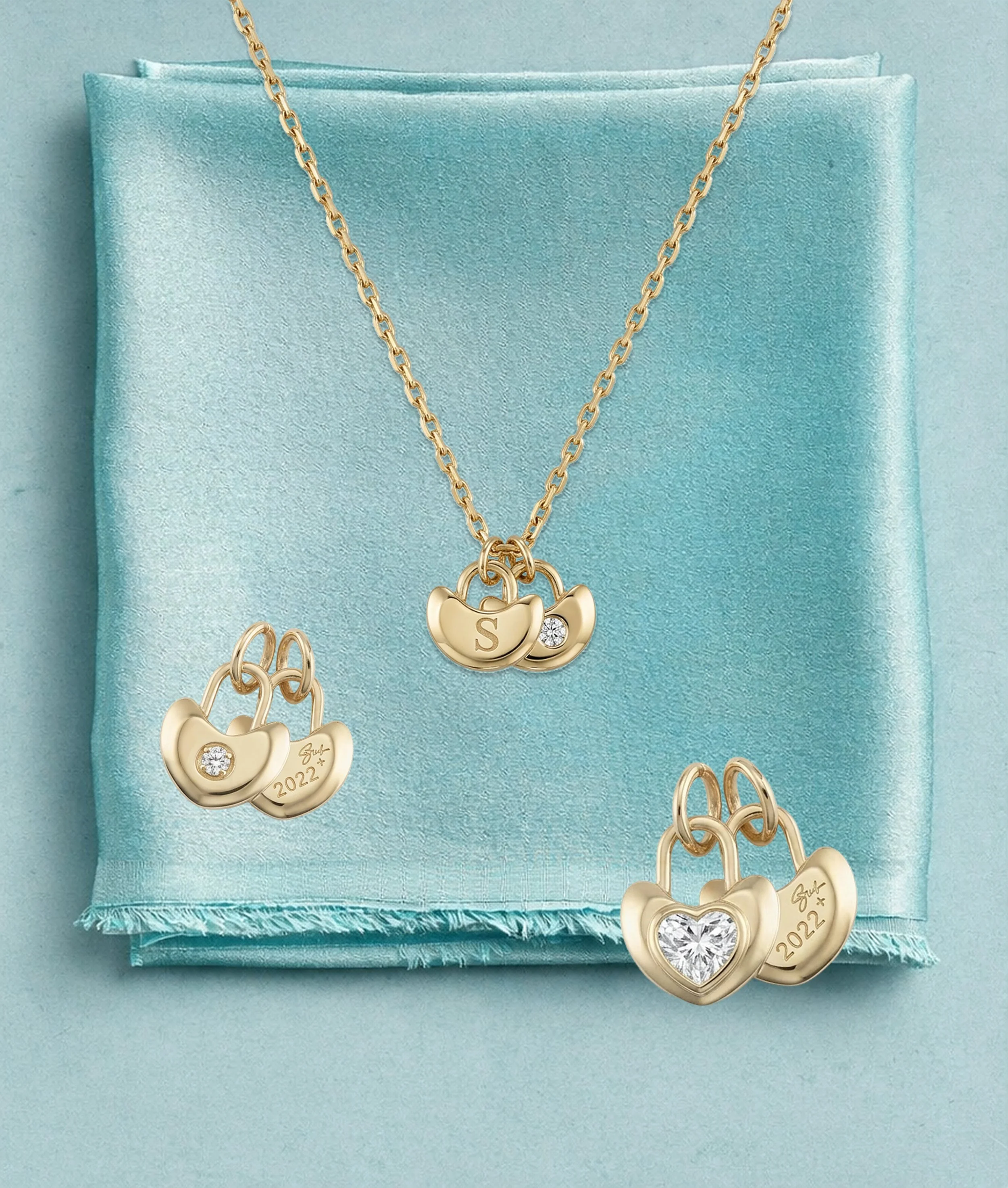 Lock Charms. For the anniversary you still count in weeks. The milestones nobody else knows about. The one person whose initial you'd wear forever.