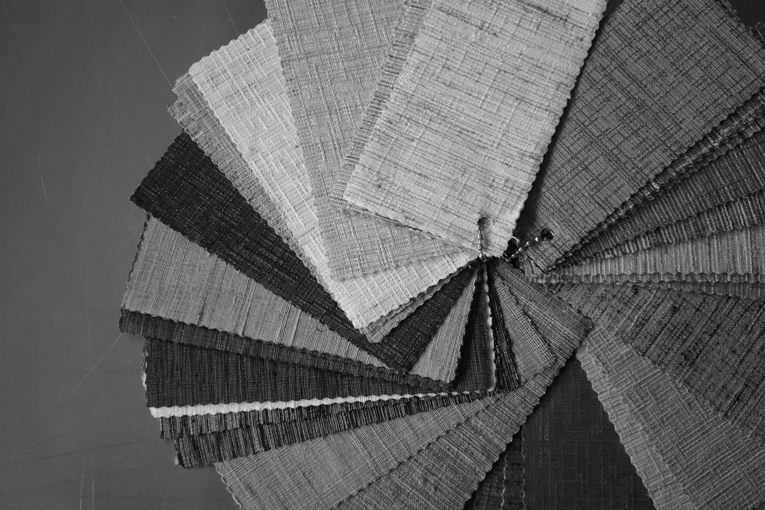Custom framing fabric swatches and mat samples at Paris Frames NYC showroom, Long Island City