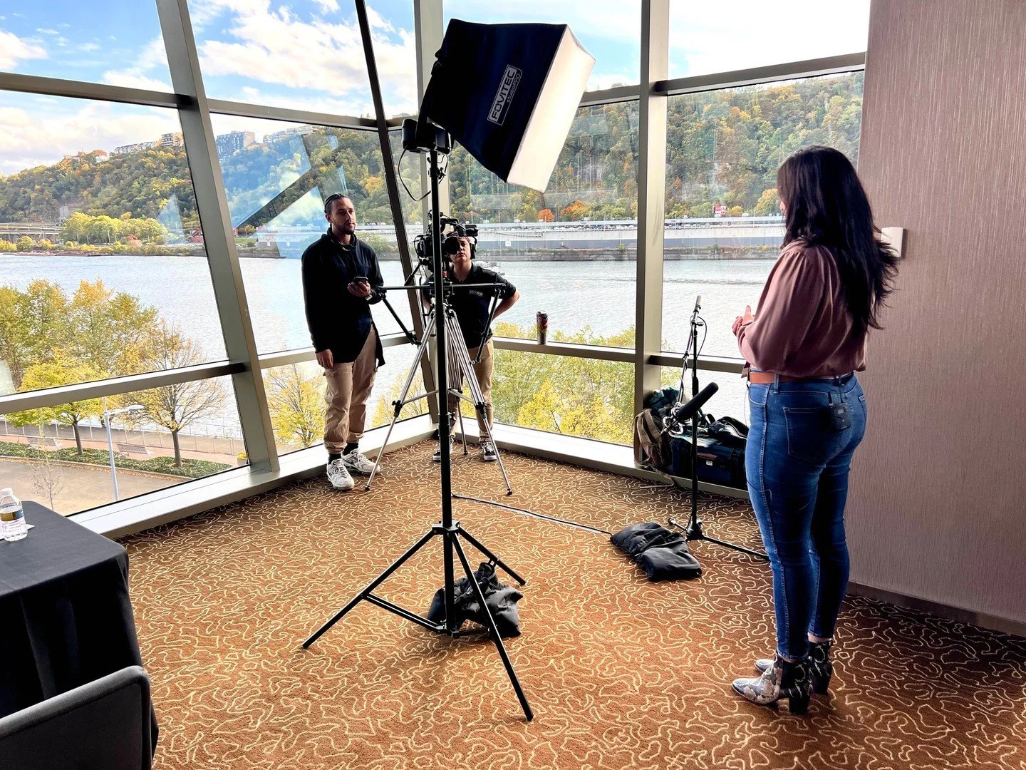Danielle Baughman participating in a professional speaking engagement and media interview focused on operational leadership, engineering support, industrial execution, and energy sector discussions.