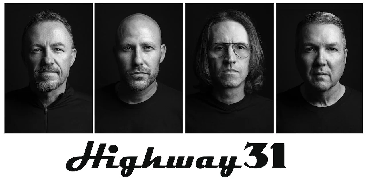 Black and white photo of four men with serious expressions, with the text 'Highway31' underneath.
