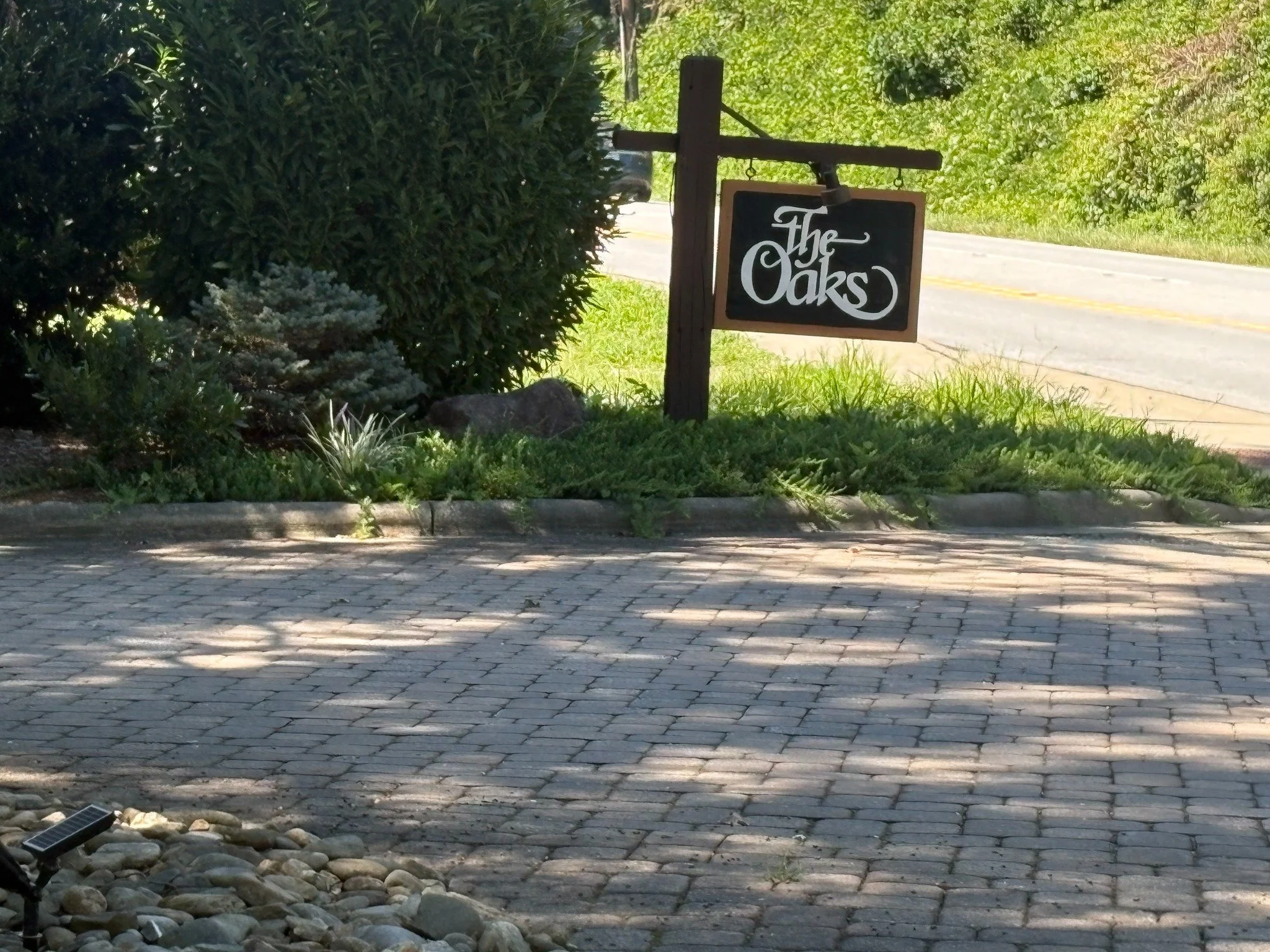 The Oaks community entrance sign in Hendersonville, North Carolina