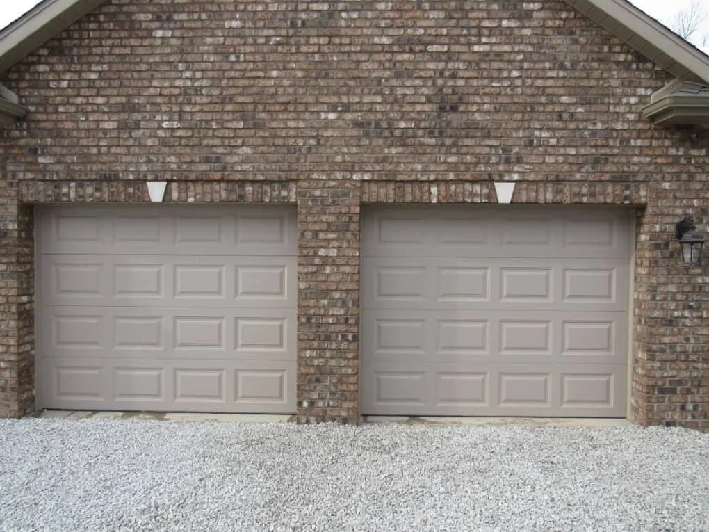 Insulated raised panel garage doors