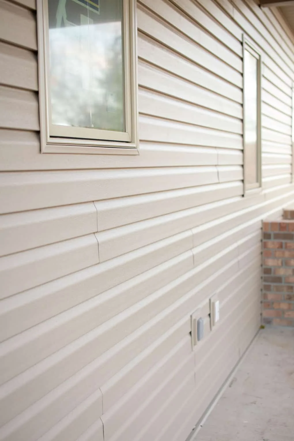 Vinyl siding on non-brick areas