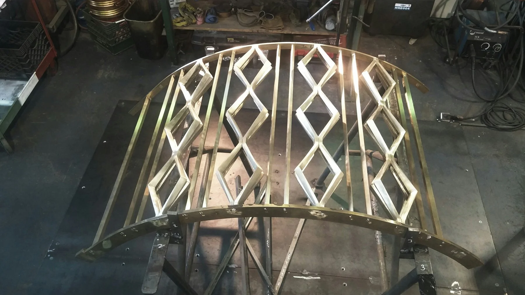 Brass and Crystal Handrail (close-up) - Cast and machined spindles with custom forged brass handcap. NYC