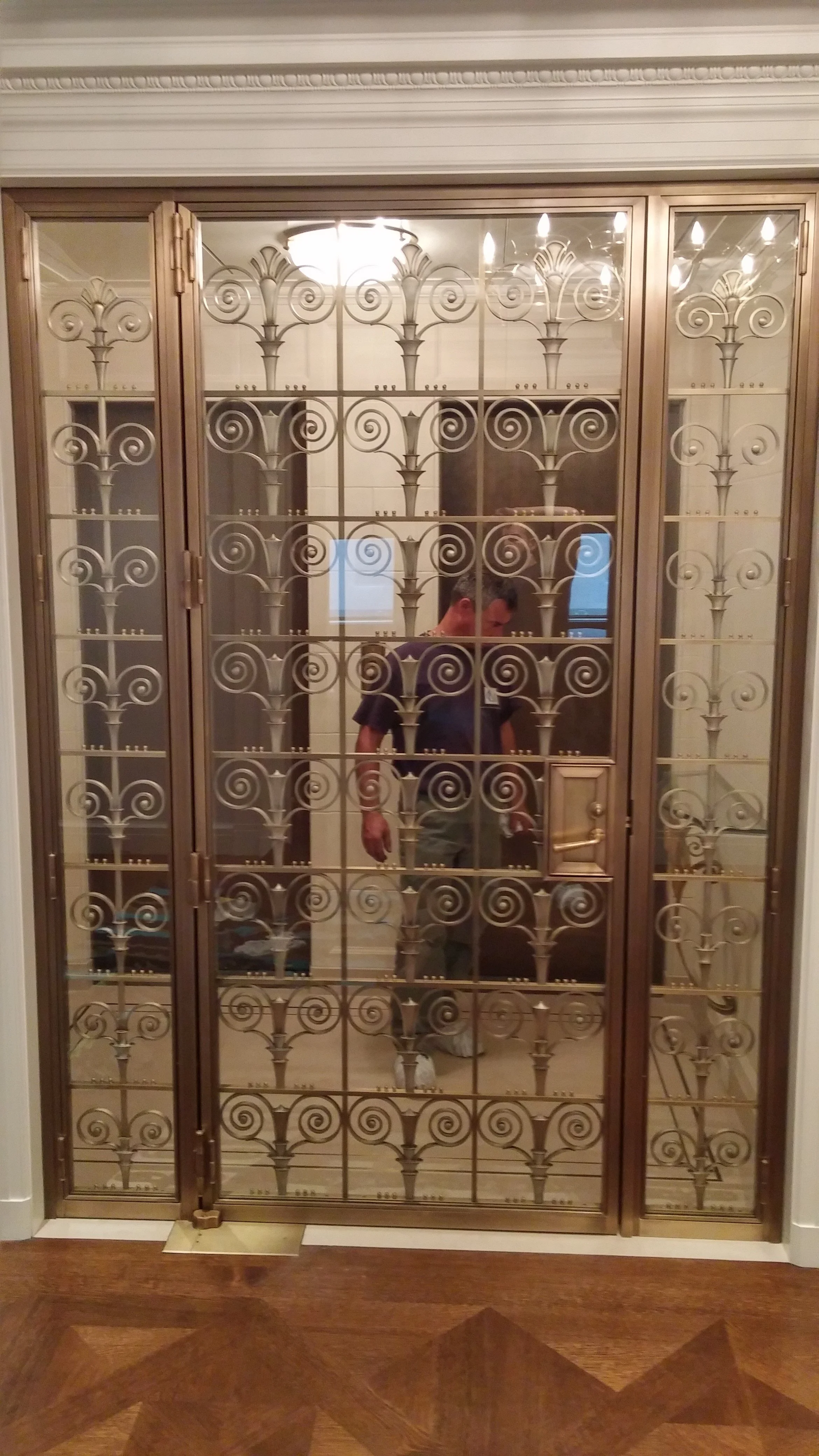 Art Deco Elevator foyer - Custom forged, machined and fabricated brass entryway outside of a personal condo elevator. NYC