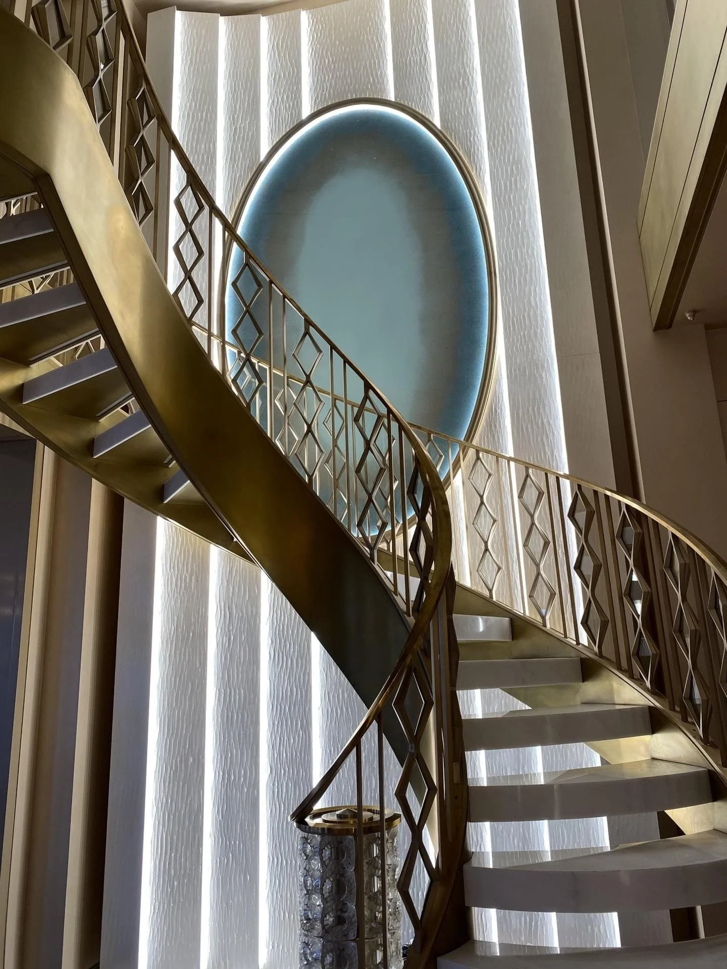 Brass and Crystal Handrail - Cast and machined spindles with custom forged brass handcap. NYC