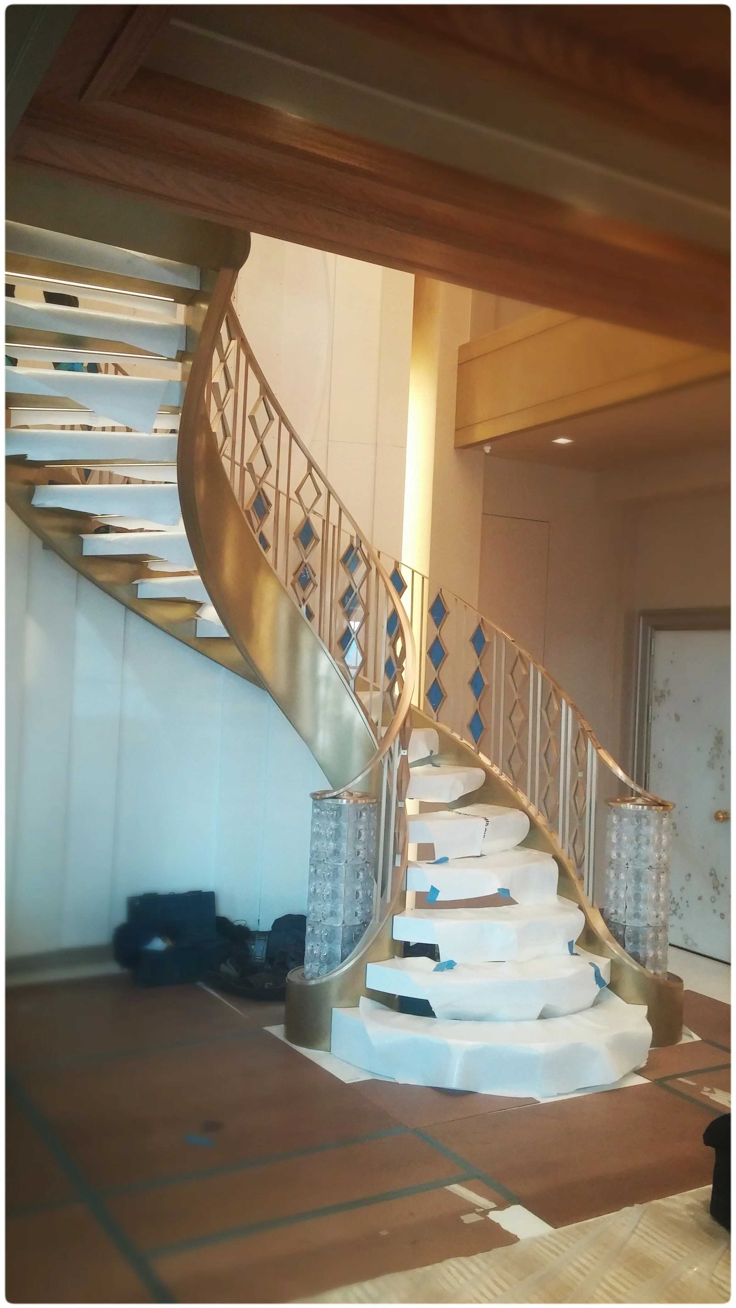 Brass and Crystal Handrail - Cast and machined spindles with custom forged brass handcap. NYC