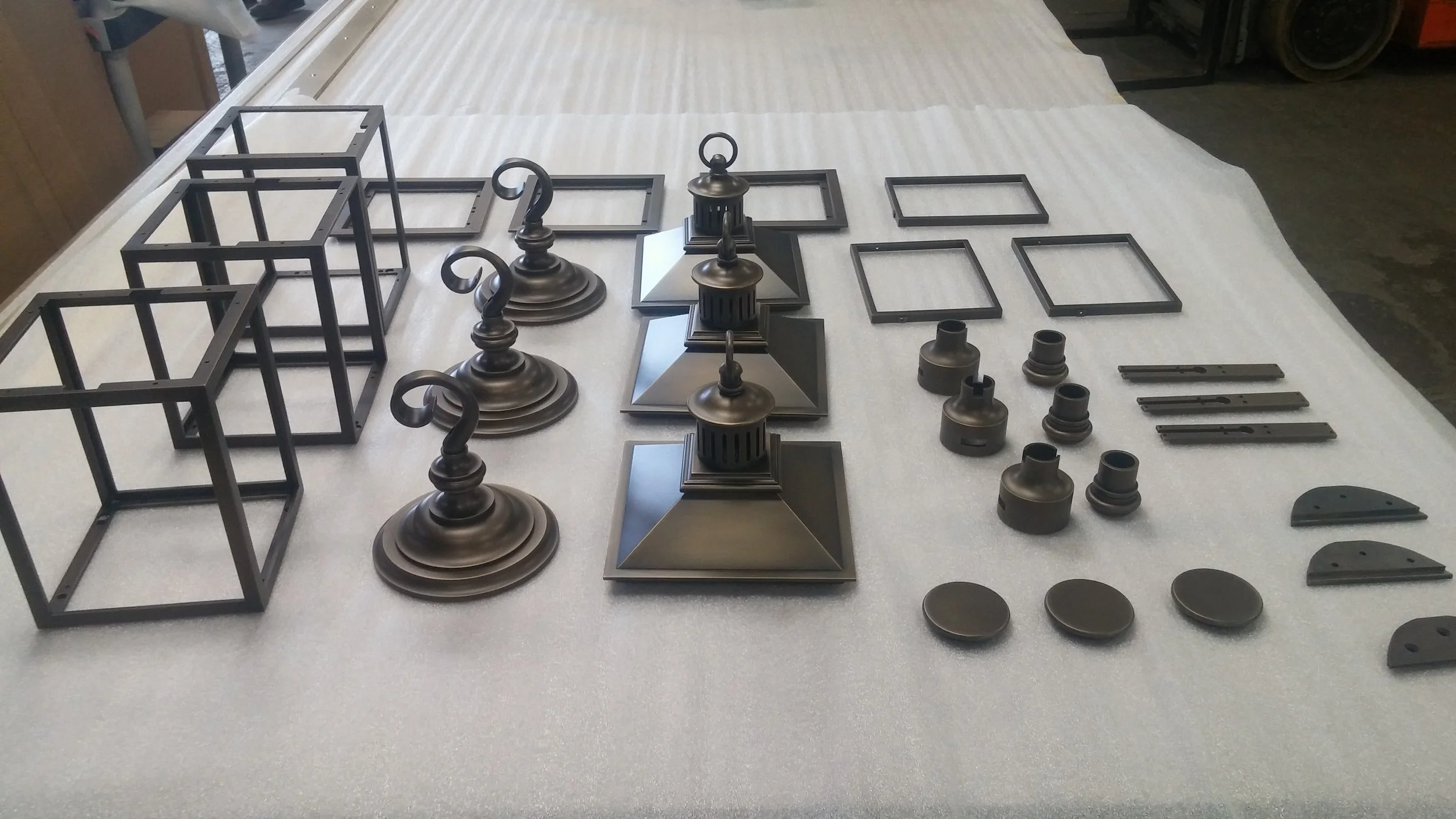 Coachhouse Lanterns - Forged and machined from brass and finished with traditional patina.  NY